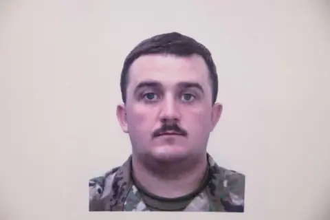 Reuters A picture of National Guard member Andrew Wolfe