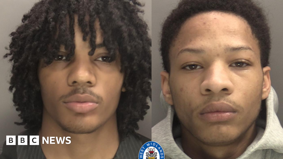 Couple lying on levels in a wooden sauna