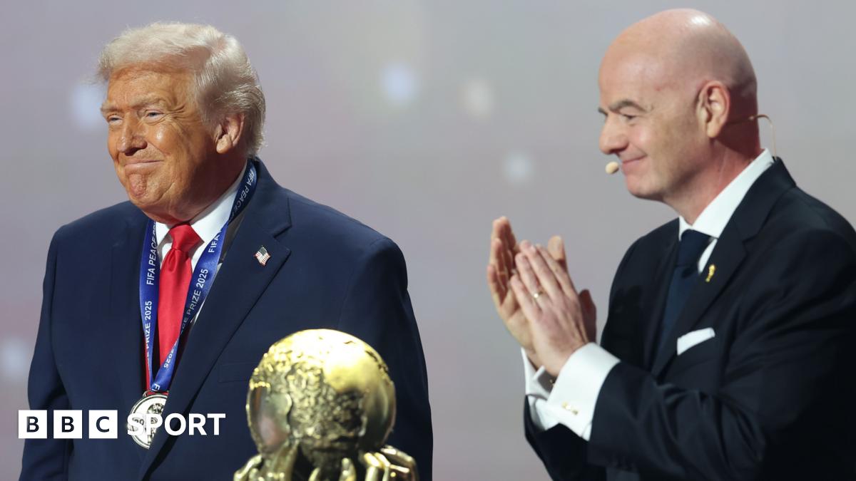 Donald Trump and Gianni Infantino with the Fifa Peace Prize trophy
