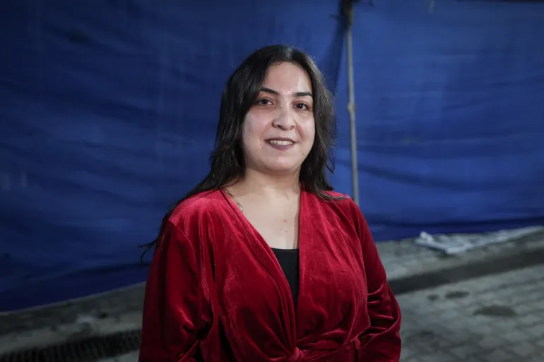 Janet Massat lives in the church with her parents and siblings and hopes the war won’t return so she can resume her work in psychology 