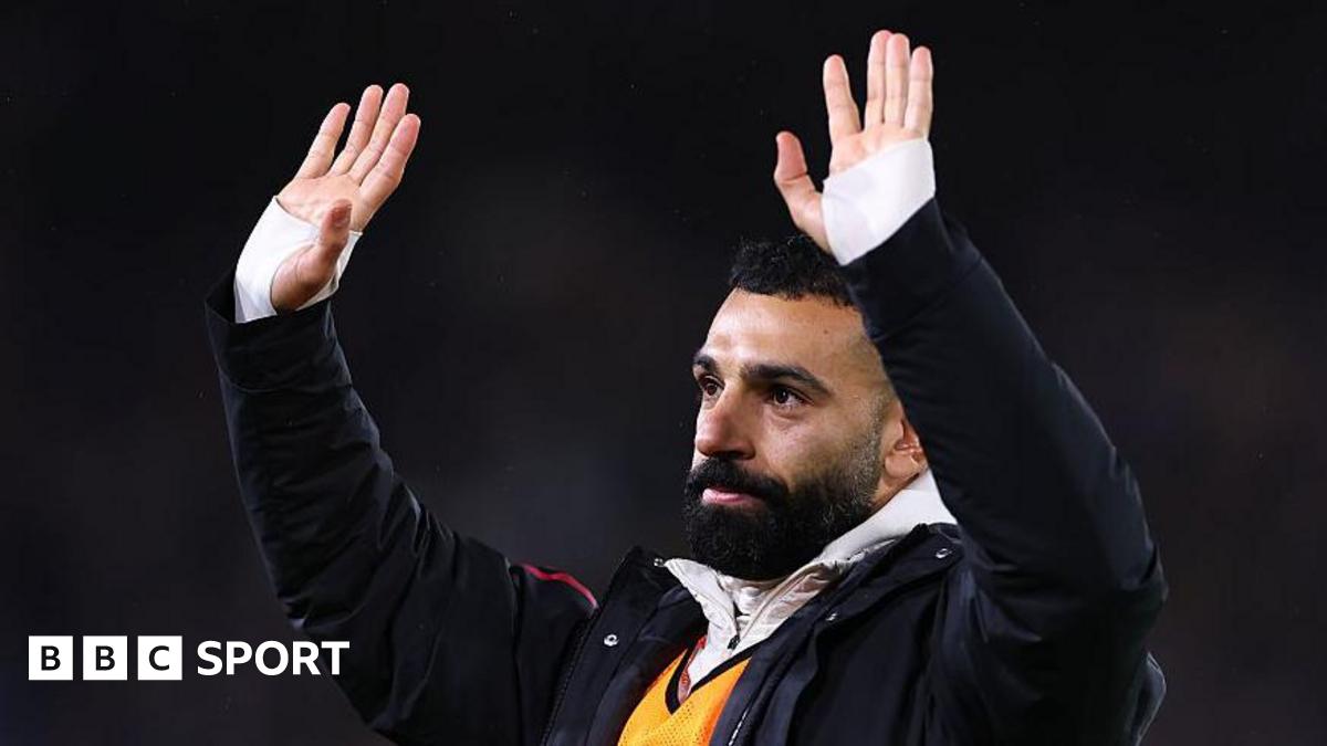 Mohamed Salah waving towards the Liverpool fans at Elland Road