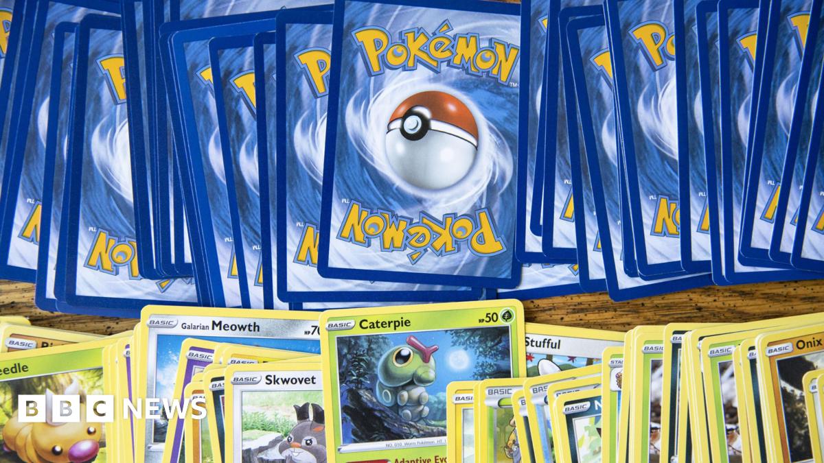 A row of rear facing Pokémon cards with a row of front facing cards beneath