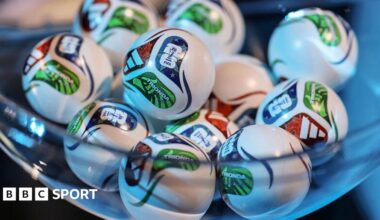 Draw assistant Tom Brady draws out the card of England