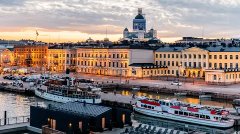 Getty Images Helsinki waterfront with boats in the foreground and the cathedral in the background.
