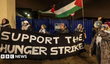A protest outside a prison in support of prisoners on hunger strike over Palestine-related causes