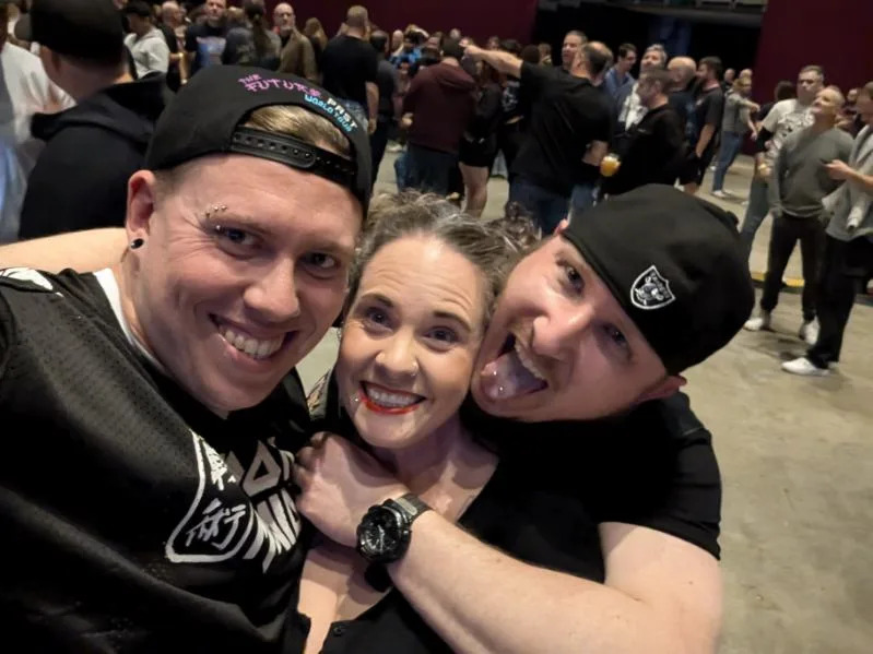 Sydney man Daniel and friends at a venue. 