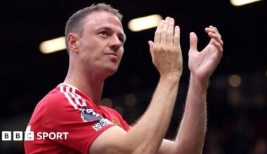 Jonny Evans applauding fans