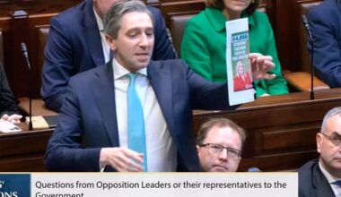 ‘Pantomime’ erupts in Dail as Simon Harris holds up graphic of Michelle O’Neill