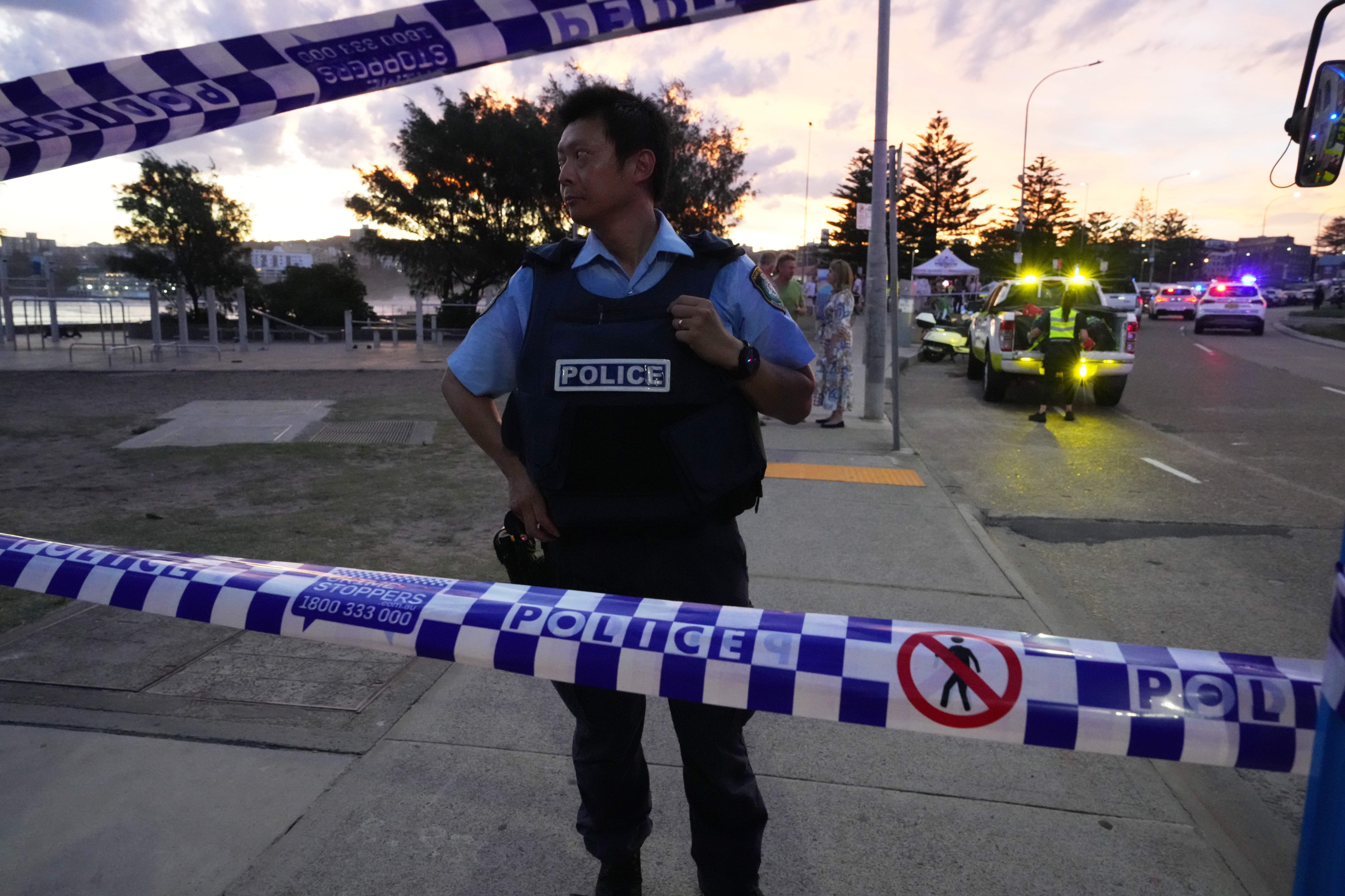 Police cordon off an area at Bondi Beach after the shooting