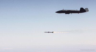 An MQ-28 Ghost Bat fires an AIM-120 missile to successfully demonstrate a force integrated air-to-air autonomous weapon engagement. (Boeing)