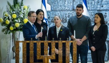 Candle lightings nationwide on Hanukkah's first night honor final hostage Ran Gvili