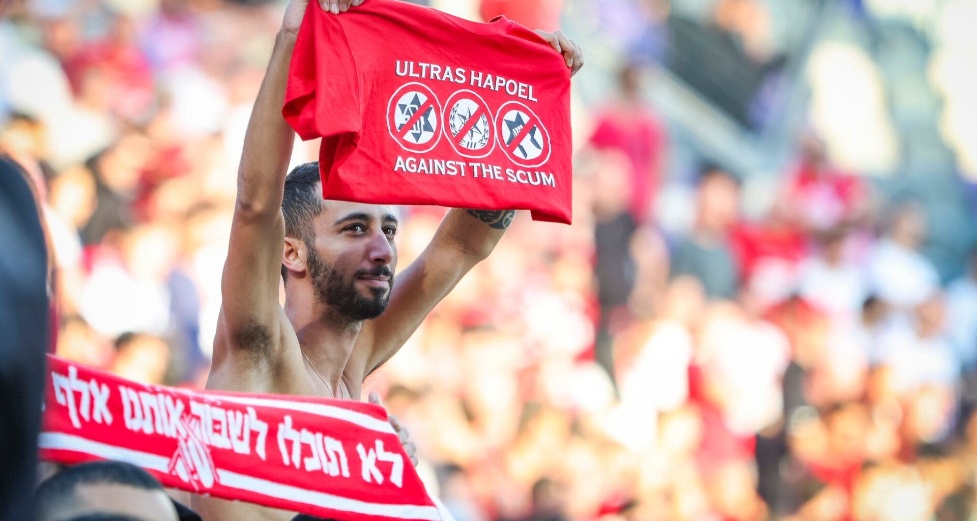 High Court freezes police ban on soccer fans wearing shirts calling cops 'scum'