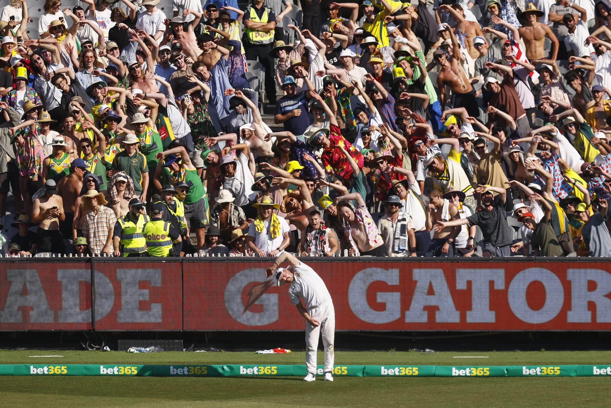 Fans in Bay 13 imitate South Africa's Anrich Nortje's warming-up exercises in December 2022