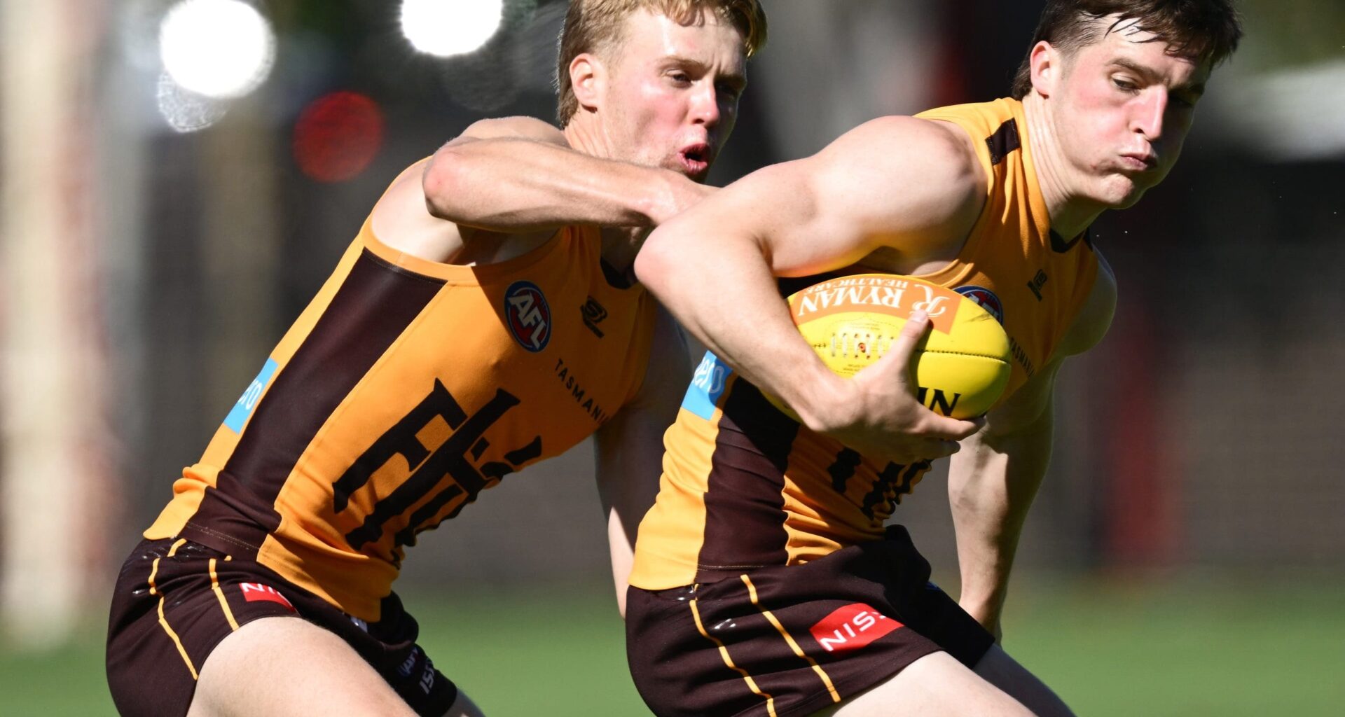 MELBOURNE, AUSTRALIA - MARCH 18: Josh Ward of the Hawks is tackled by Cam Mackenzie of the Hawks during a Hawthorn Hawks AFL training session at Waverley Park on March 18, 2025 in Melbourne, Australia. (Photo by Quinn Rooney/Getty Images)