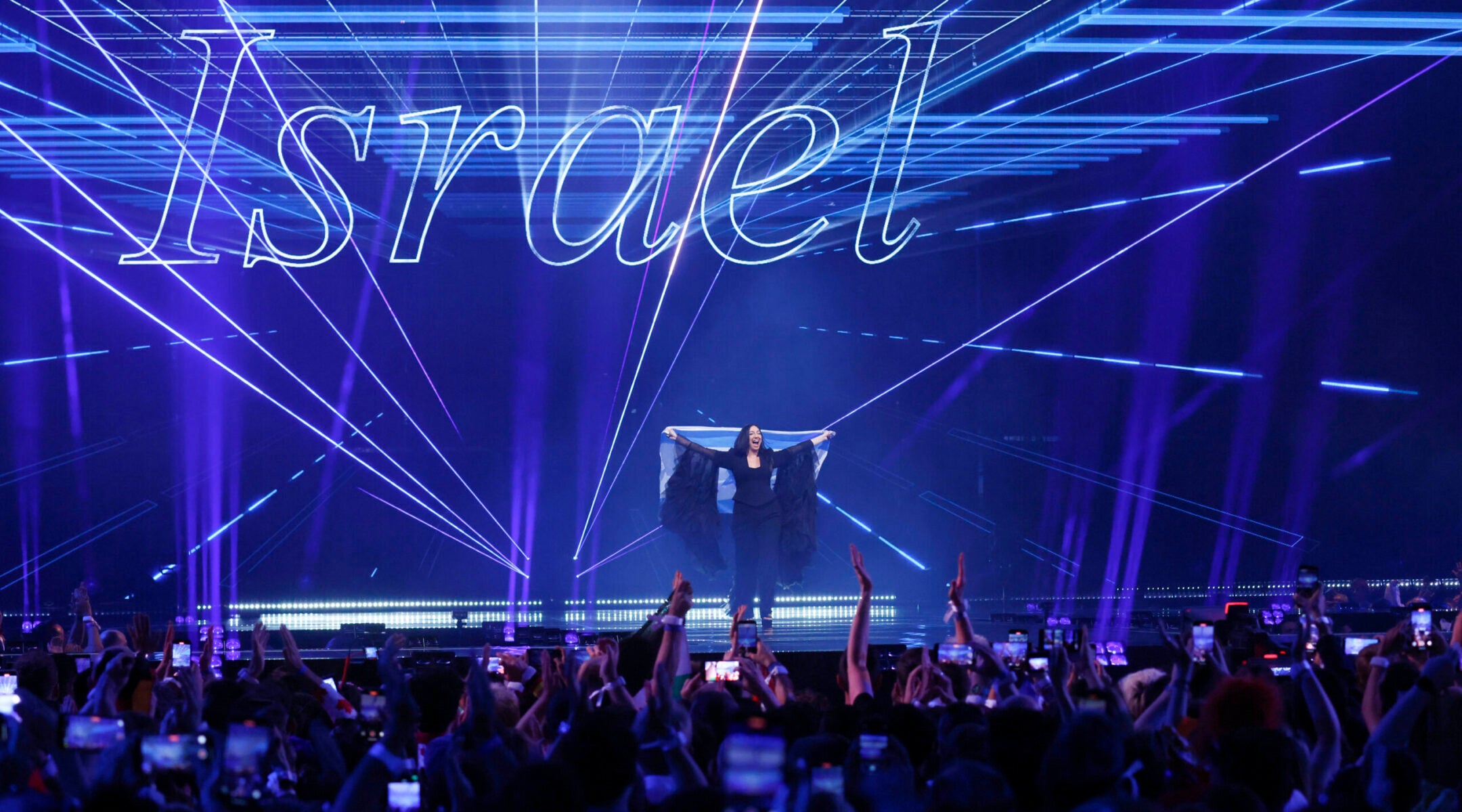 Yuval Raphael representing Israel walks on stage during the Grand Final of the 69th Eurovision Song Contest Opening Ceremony at St. Jakobshalle on May 17, 2025 in Basel, Switzerland. 