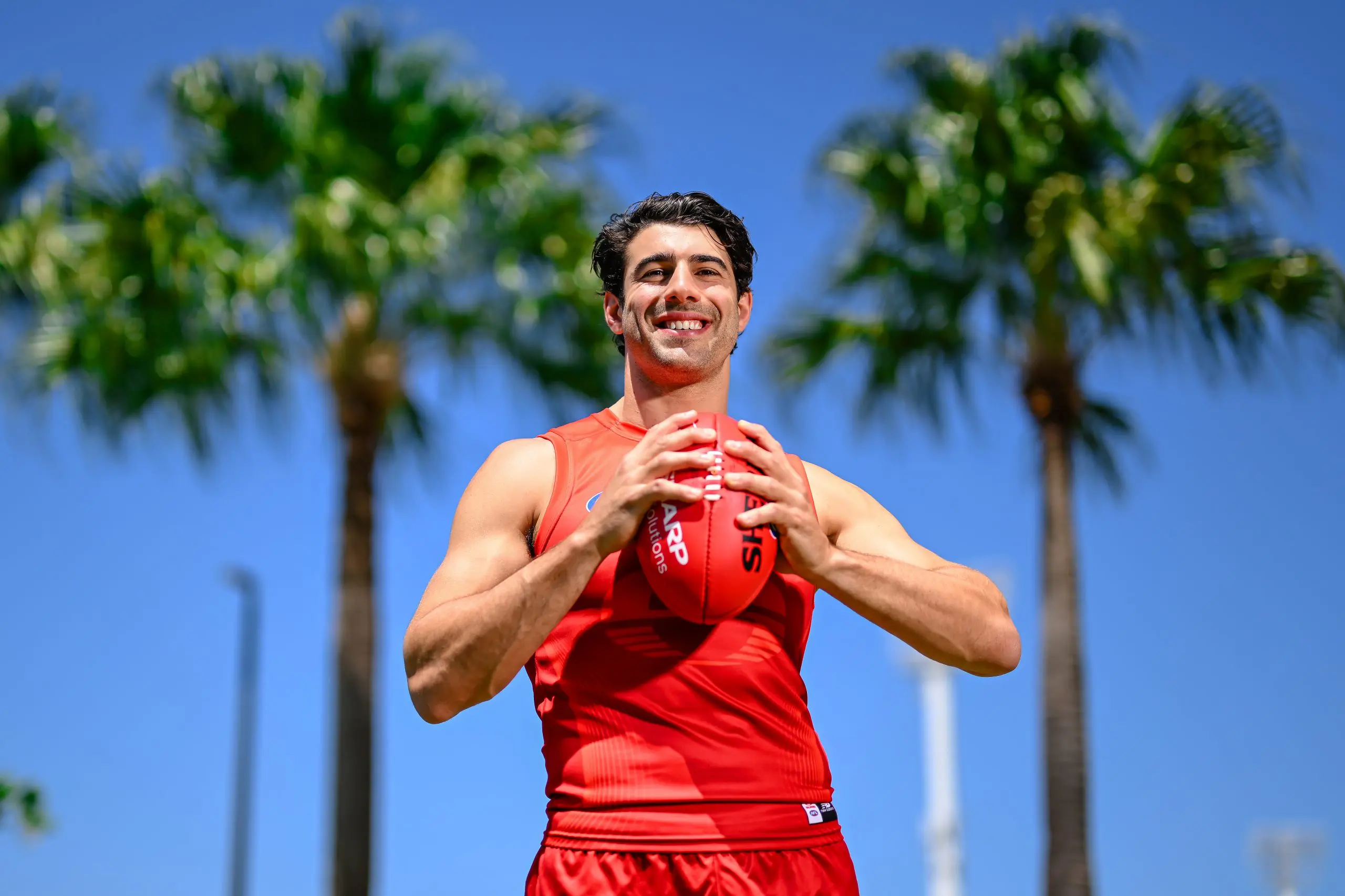 GOLD COAST, AUSTRALIA - OCTOBER 17: Christian Petracca poses during a media opportunity with the Gold Coast Suns at People First Stadium on October 17, 2025 in Gold Coast, Australia. (Photo by Albert Perez/Getty Images)