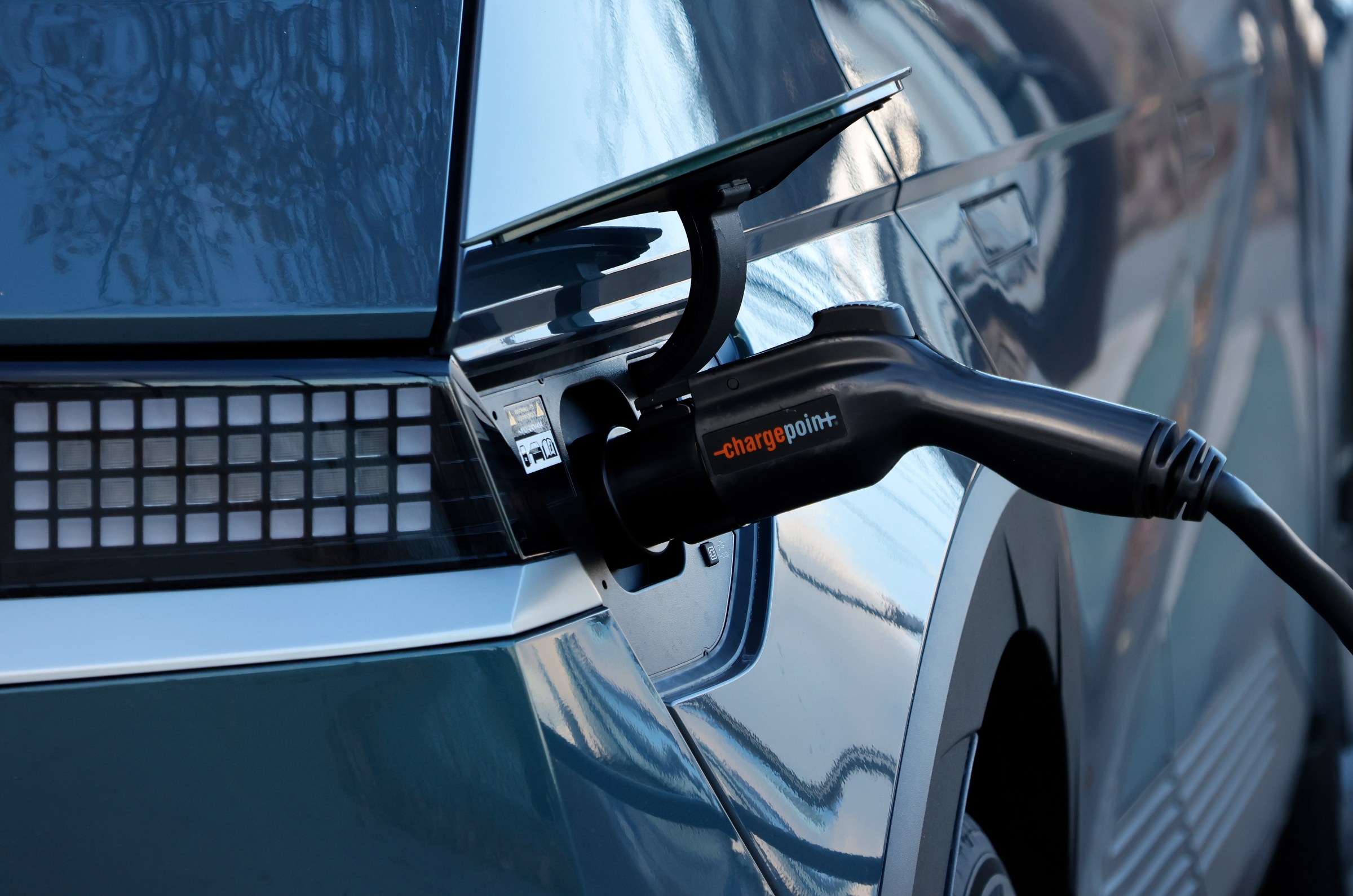 A car at an EV charger