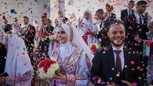 54 couples marry in mass wedding on ruins of Khan Younis in UAE-sponsored event