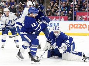Toronto Maple Leafs goaltender Dennis Hildeby makes a save in Toronto, Monday, Dec. 8, 2025.