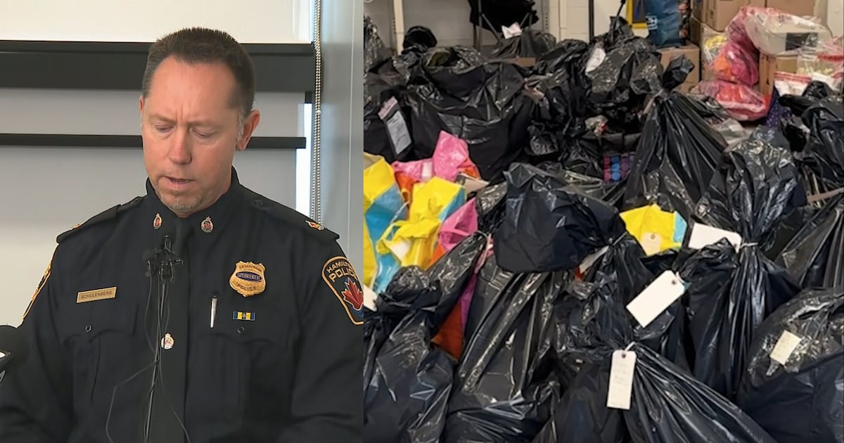 Police charge 21 in theft over $1 million