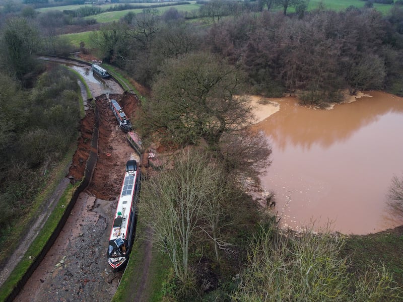 Ten people have been helped to safety after a 50m sinkhole breached a canal in Shropshire. Photo. Photograph: Andy Kelvin/PA Wire