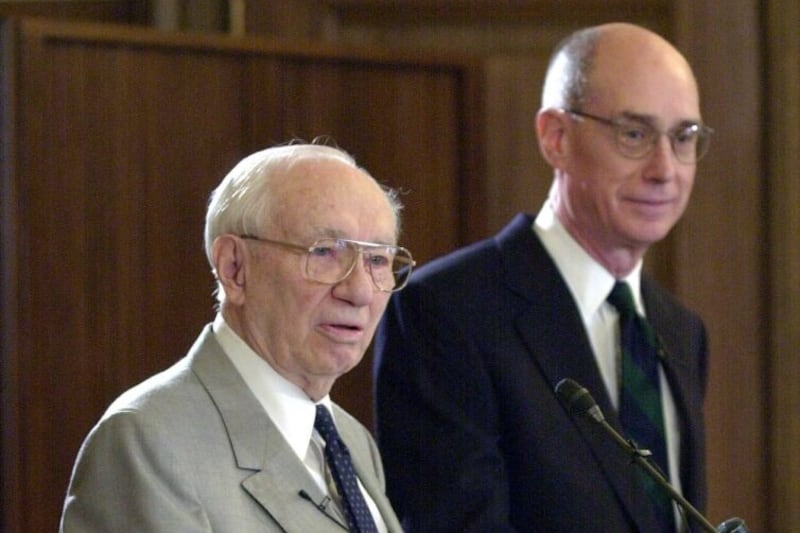 President Gordon B. Hinckley and Elder Henry B. Eyring announce plans to change Ricks College into BYU–Idaho, a four-year university.