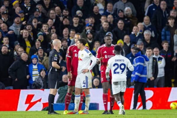 LEEDS, ENGLAND - Saturday, December 6, 2025: Liverpool's captain Virgil van Dijk and Leeds United's captain Ethan Ampadu speak to referee Anthony Taylor whilst awaiting a VAR check during the FA Premier League match between Leeds United FC and Liverpool FC at Elland Road. (Photo by David Rawcliffe/Propaganda)