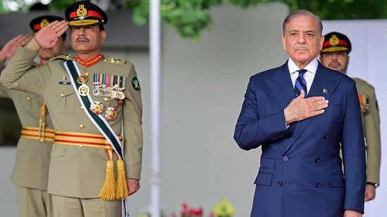 UN criticises Pakistan’s 27th amendment. Pakistan's Prime Minister Shehbaz Sharif (R) and general Asim Munir.(AFP File)