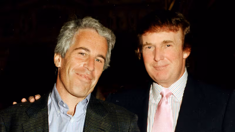 Portrait of American financier Jeffrey Epstein (left) and real estate developer Donald Trump as they pose together at the Mar-a-Lago estate, Palm Beach, Florida on February 22, 1997. (Photo by Davidoff Studios/Getty Images)