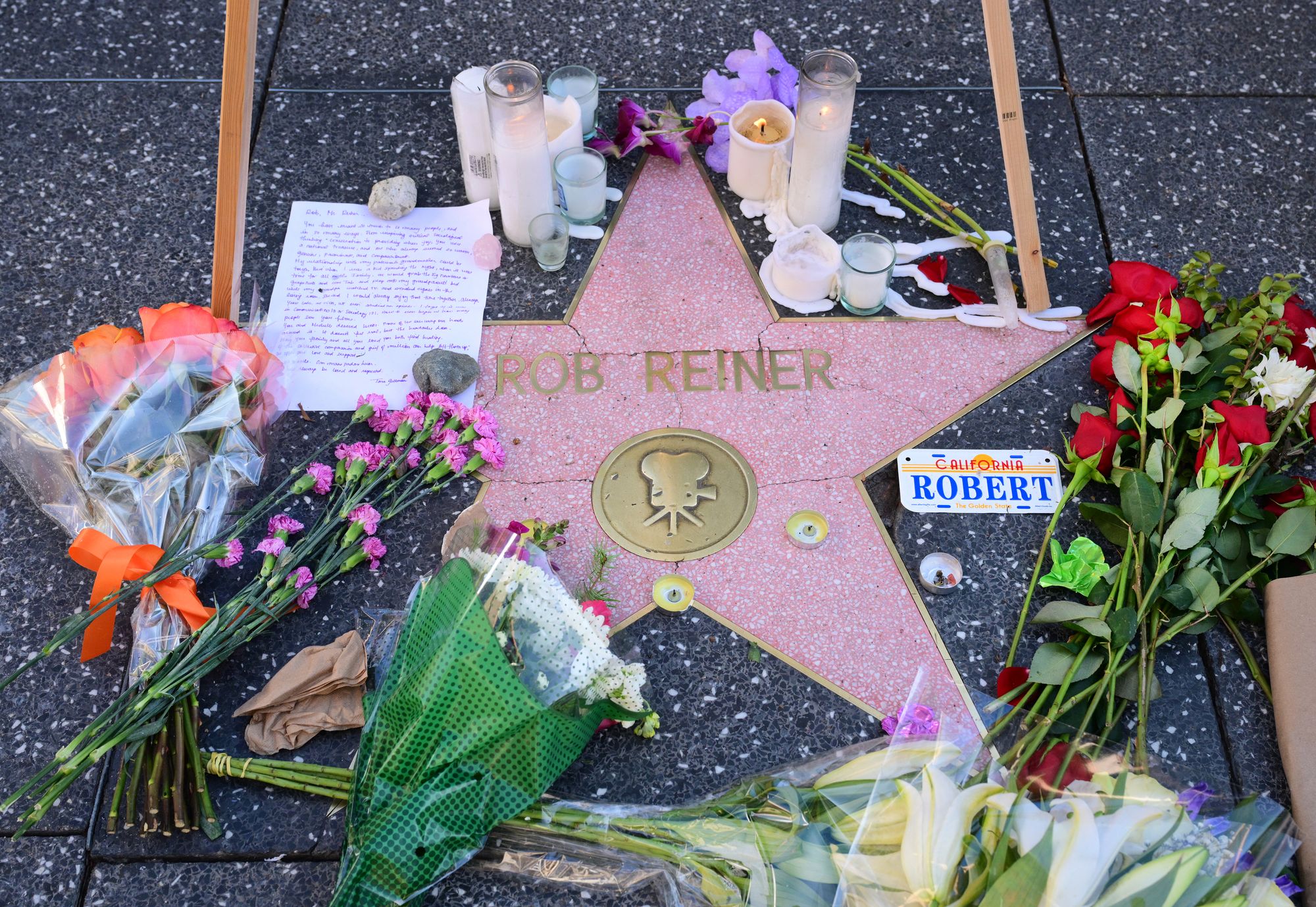 Flowers were placed on Rob Reiner’s star on the Hollywood Walk of Fame following his and his wife, Michele’s, murder
