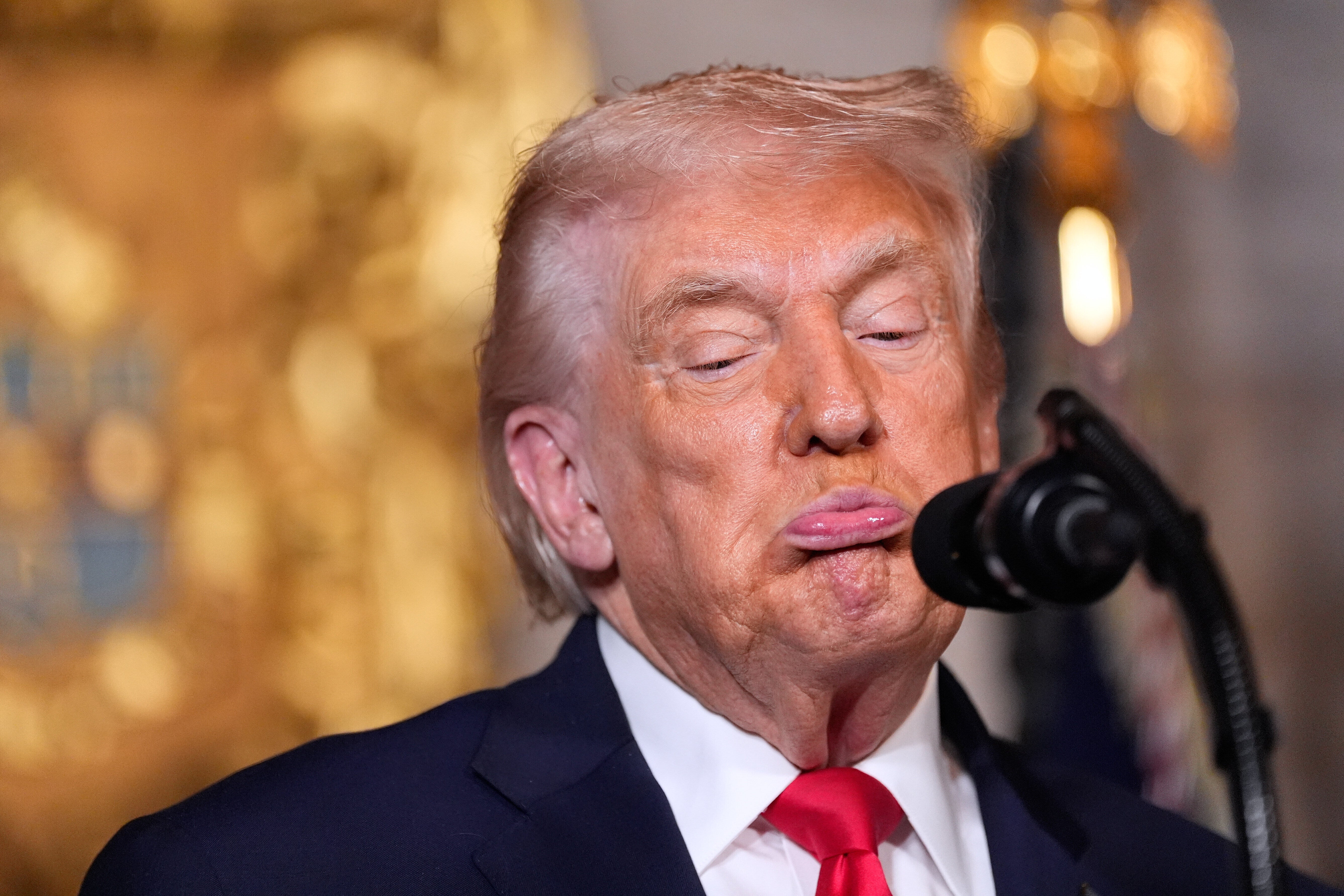 Donald Trump criticized the release of images showing high-profile figures including Bill Clinton with Jeffrey Epstein, suggesting the documents could ‘ruin the reputation’ of anyone who was ‘innocently’ photographed with the sex offender