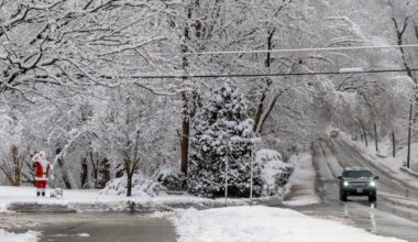 A Santa statue “waves” to drivers along Brace Road in Cherry Hill on Dec. 14, 2025. The Philly region may see its second snowfall of the season on Friday night.