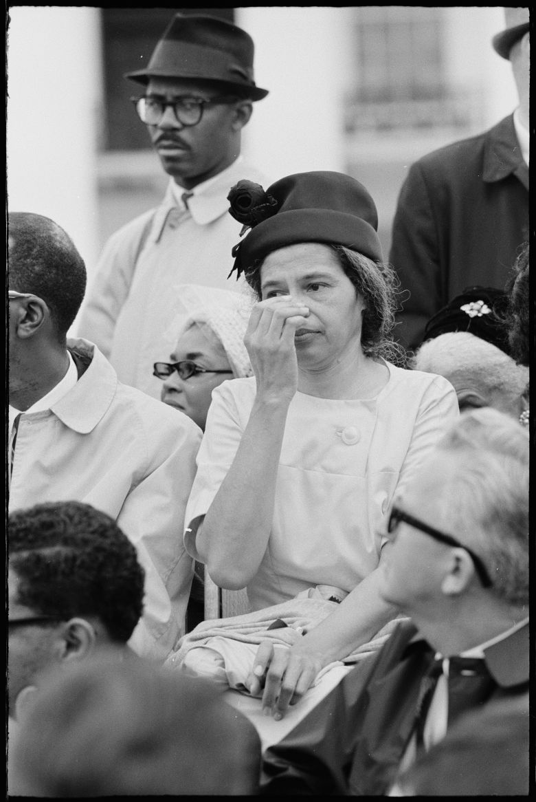 Rosa Parks amongst the crowd on March 25, 1965, at the conclusion of the 54-mile march from Selma, Alabama, to Montgomery, Alabama.