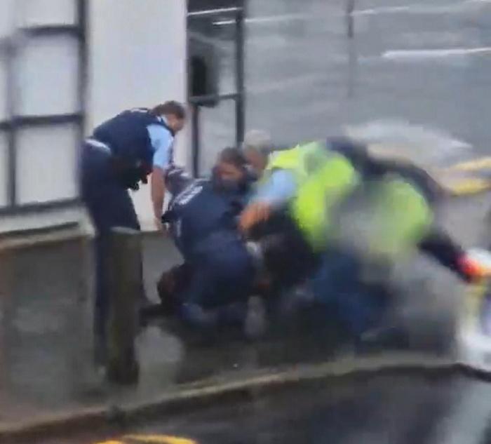 Knife-wielding man allegedly bit officer during arrest