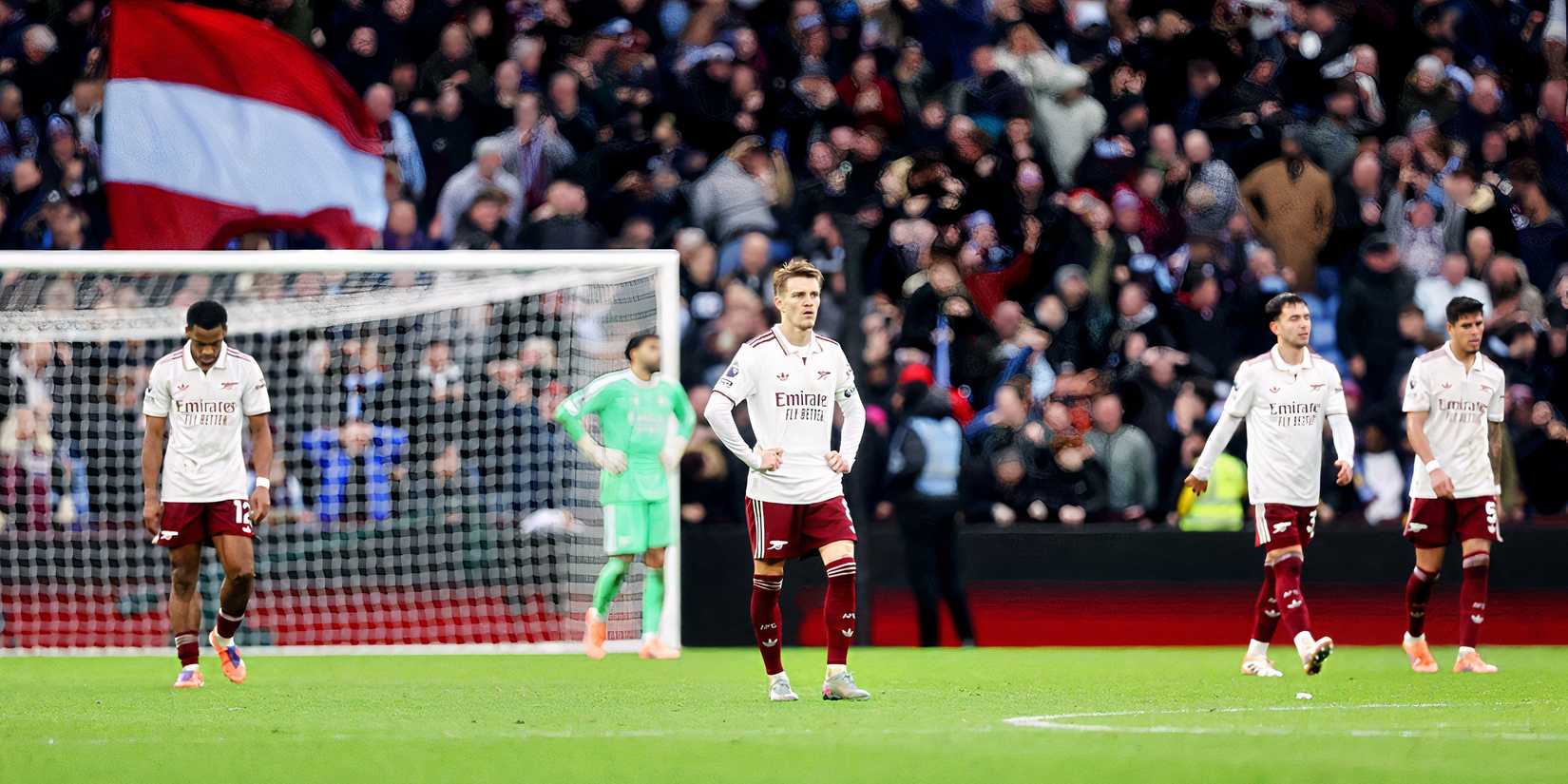 Arsenal players look dejected