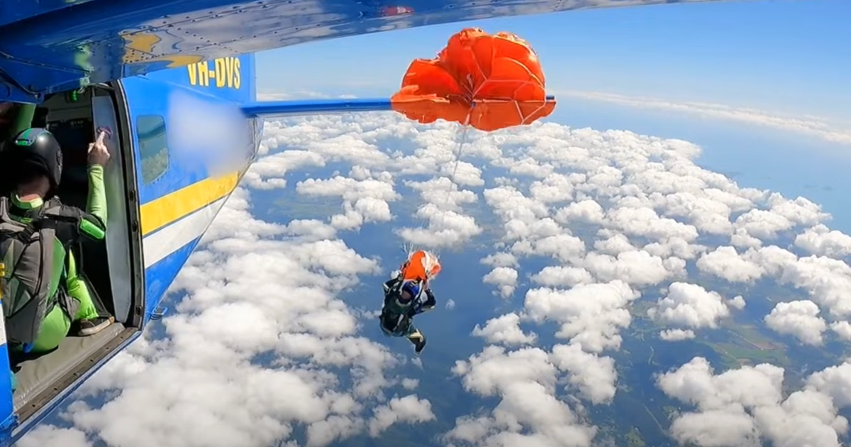 Skydiver dangles from plane in midair after parachute mishap in Australia, video shows
