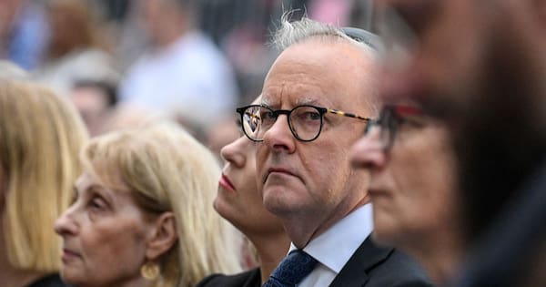 Albanese lashes 'evil' after rabbi's car torched in driveway