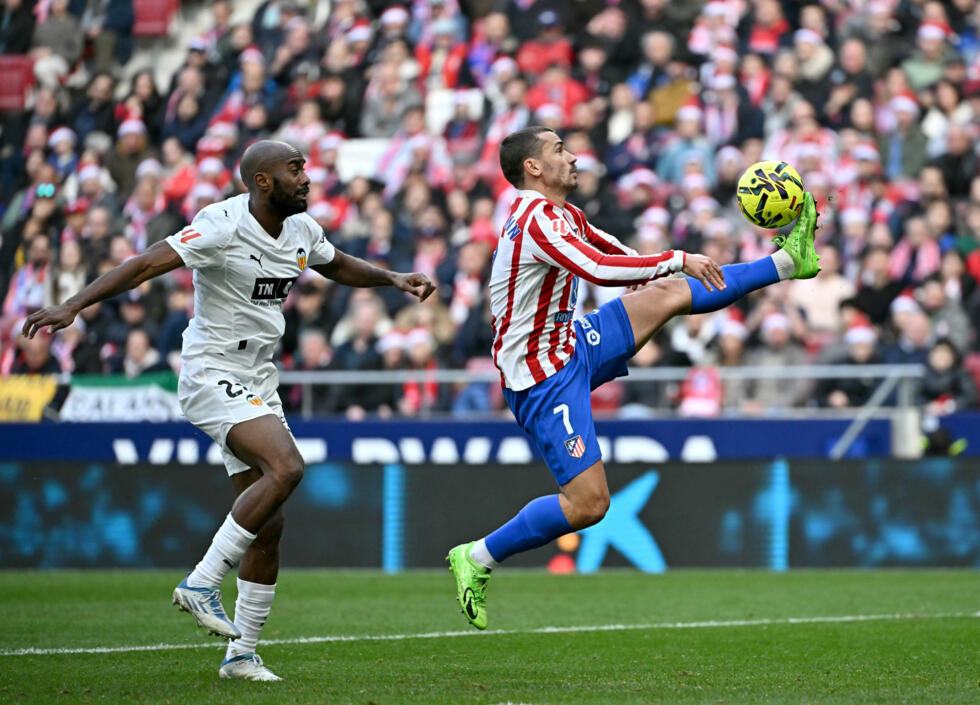 Atletico Madrid's French forward Antoine Griezmann pulled off an impressive piece of control before smashing in the winner against Valencia