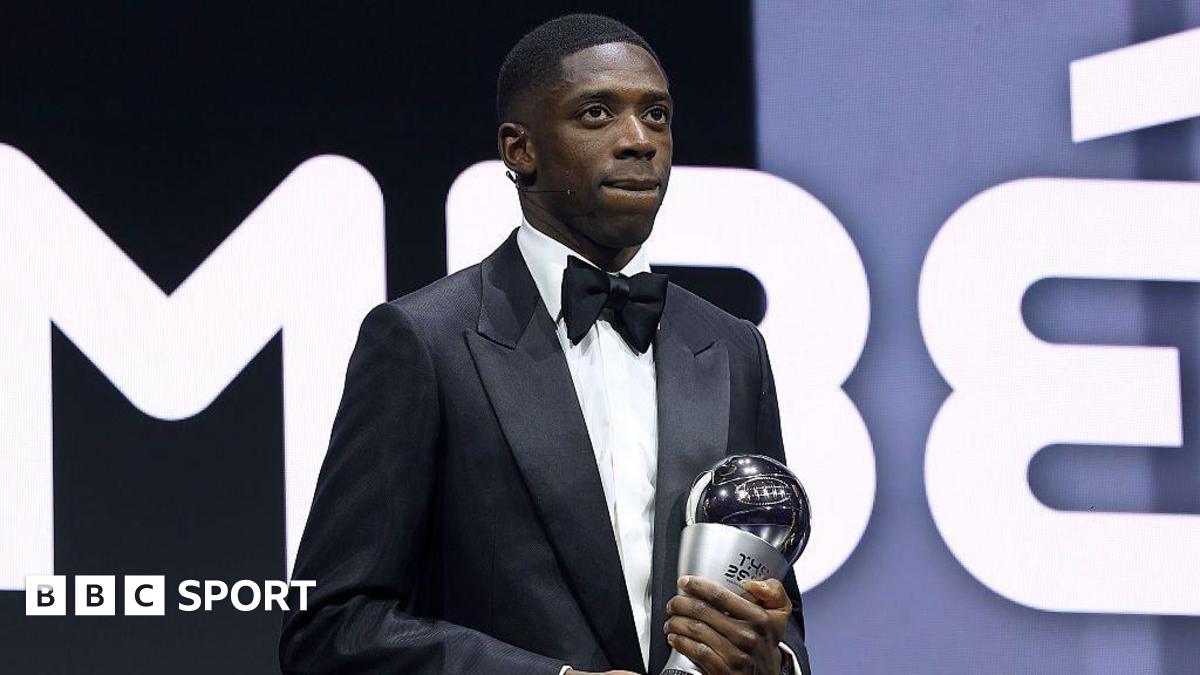Ousmane Dembele on stage with the men's player of the year trophy at the Fifa Best Awards 2025 in Doha