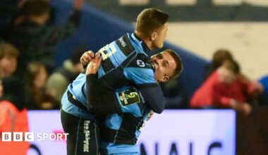 Callum Sheedy celebrates his winning kick with Cameron Winnett