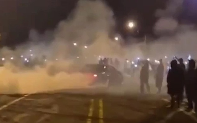 Boy racers hurl bottles, fireworks at police