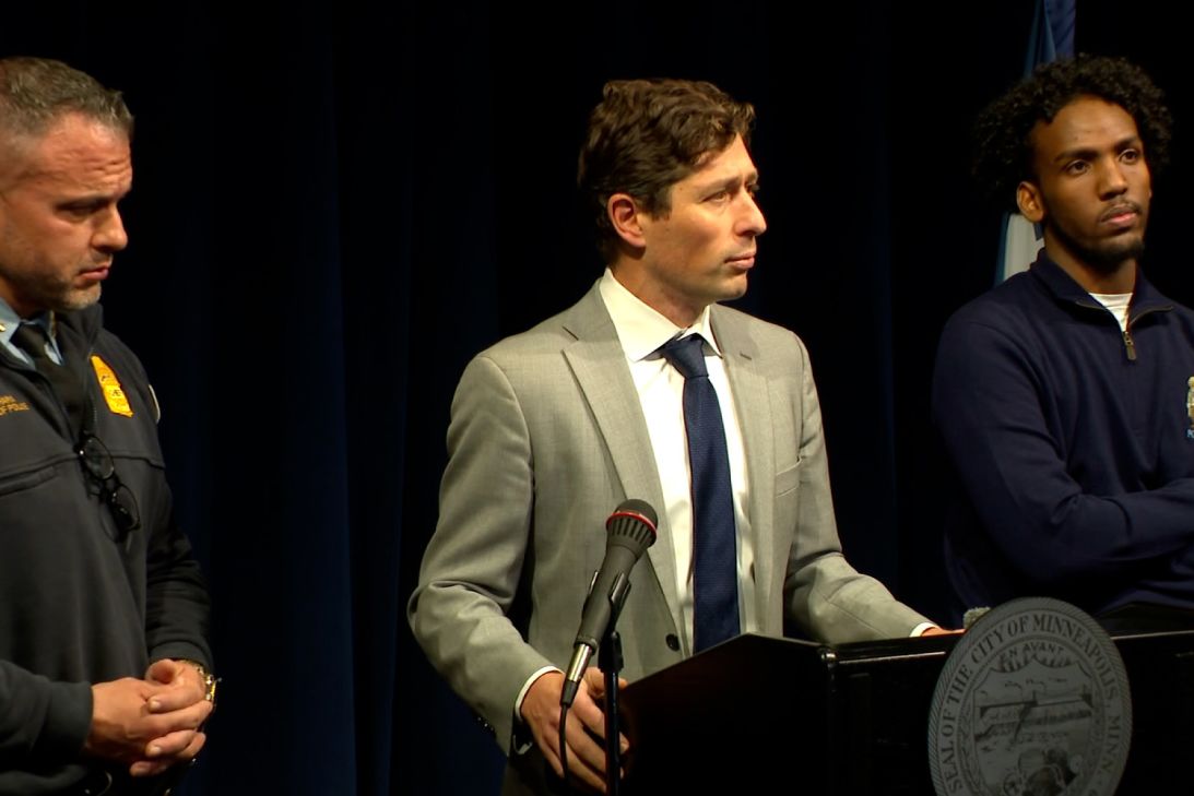 Mayor Jacob Frey, center, speaks at a news conference alongside Mubashir, right, and Police Chief Brian O'Hara, left, at Minneapolis City Hall on Wednesday.