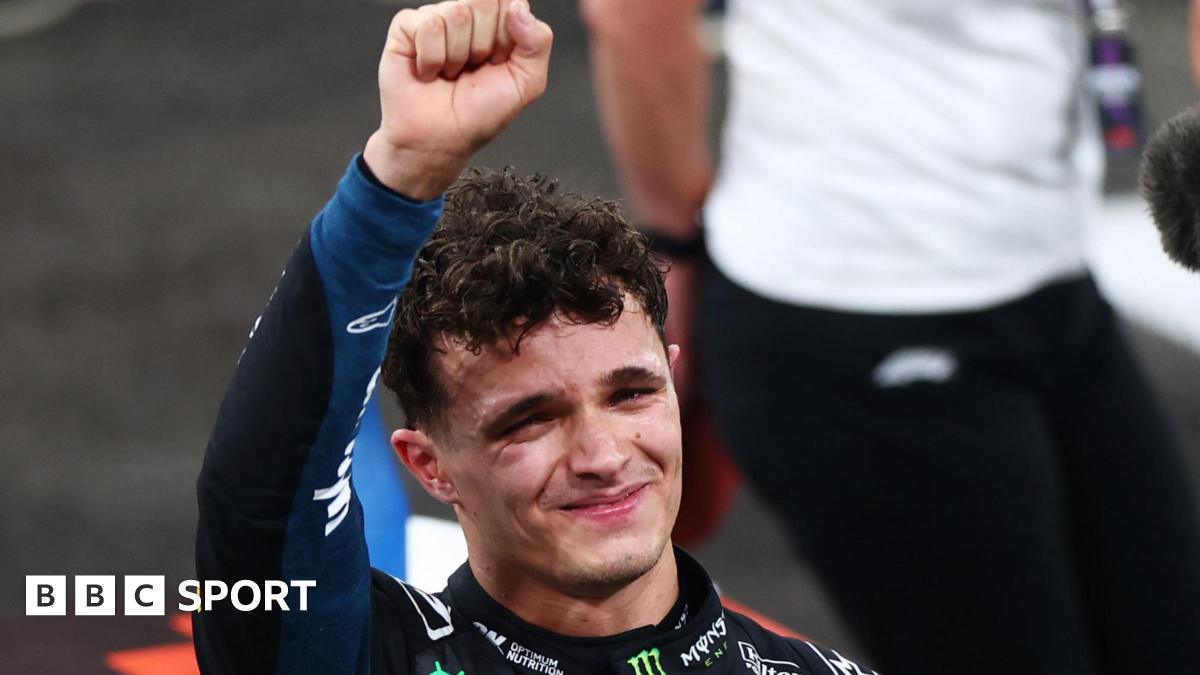 McLaren's Lando Norris is tearful as he lifts his fist in celebration after winning the F1 drivers' title in the Abu Dhabi Grand Prix