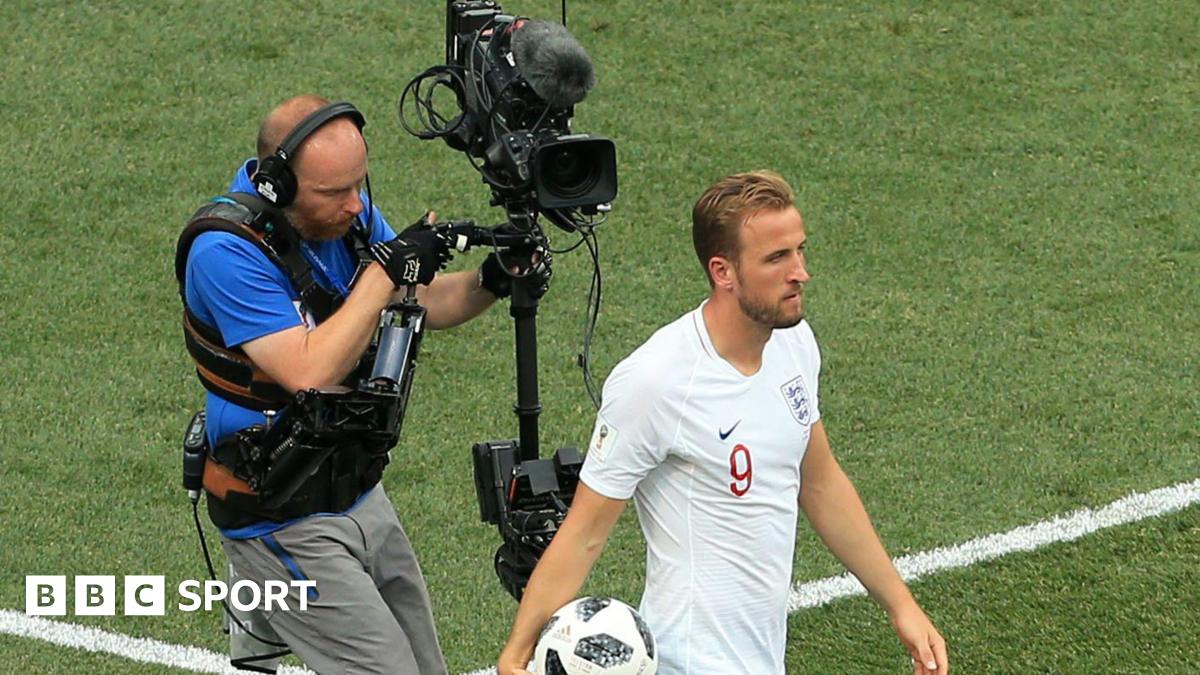Harry Kane is filmed by a cameraman at the 2018 World Cup