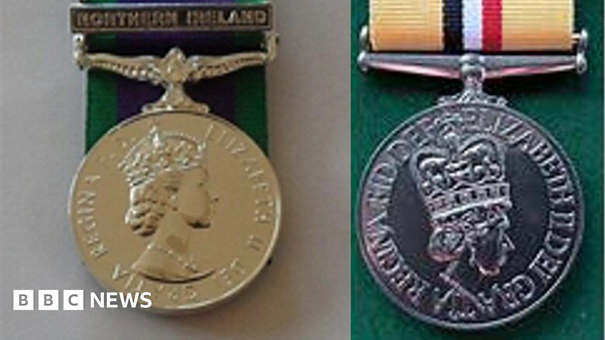 Two medals. Both show pictures of Queen Elizabeth II. the medal on the left is golden in colour and Northern Ireland is written on its clasp. The medal on the right is silver.