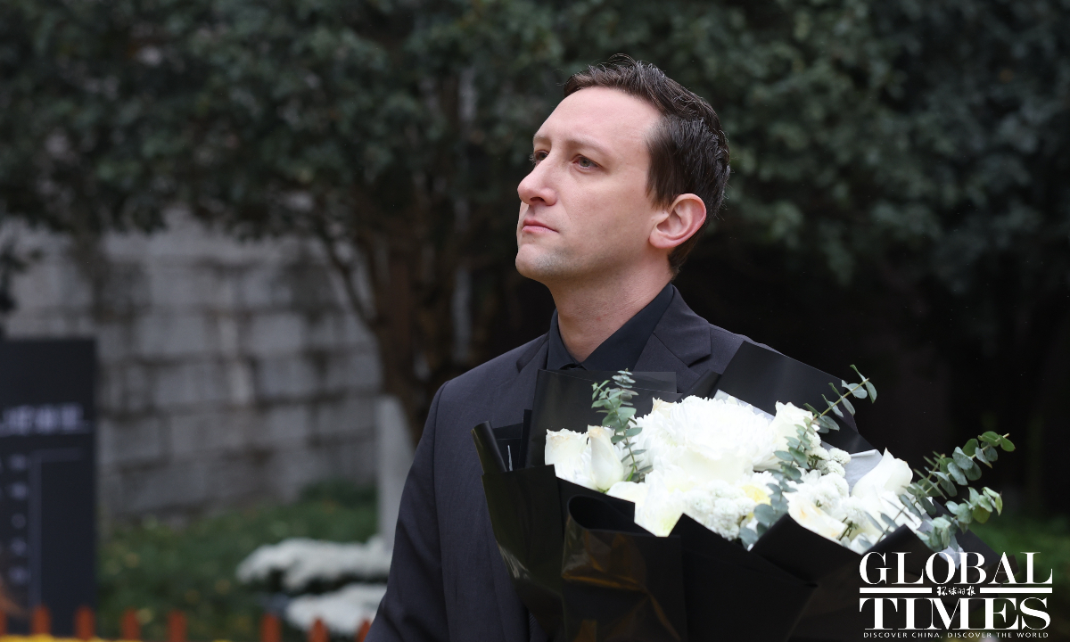 Evan Kail, a Minnesota-based pawnshop owner who gained international attention after donating a rare photo album documenting Japanese war crimes during World War II to China, attends commemorating activities at a mass burial site near Zhengjue Temple in Nanjing, East China’s Jiangsu Province on December 13, 2025. Photo: Cui Meng/GT