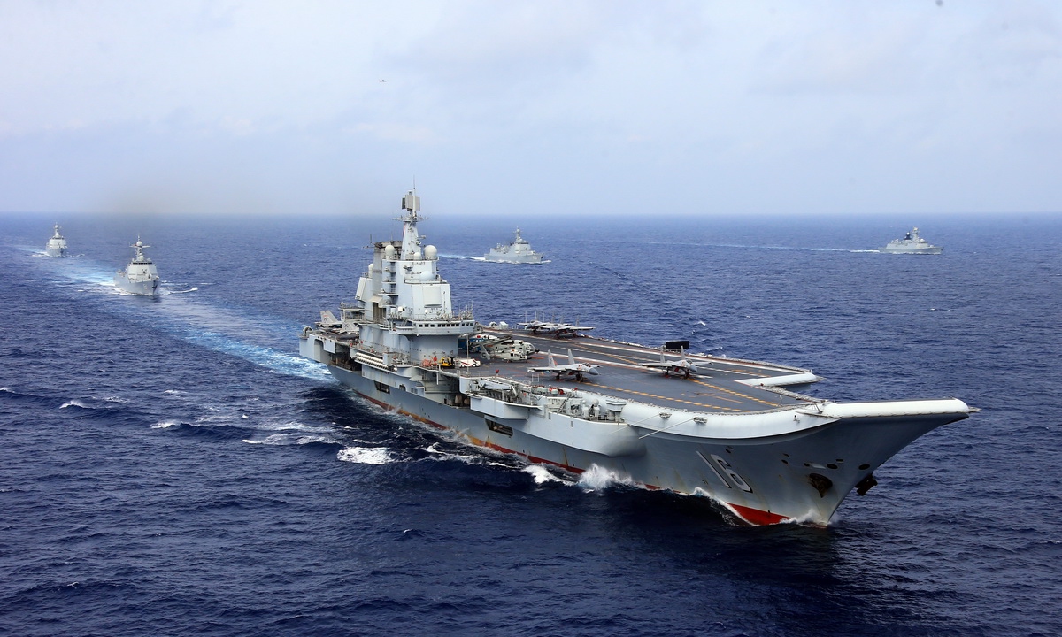 The aircraft carrier Liaoning battle group steam on the sea. The aircraft carrier Liaoning (Hull 16), several guided-missile destroyers, frigates and dozens of aircraft attached to the Navy of the Chinese People