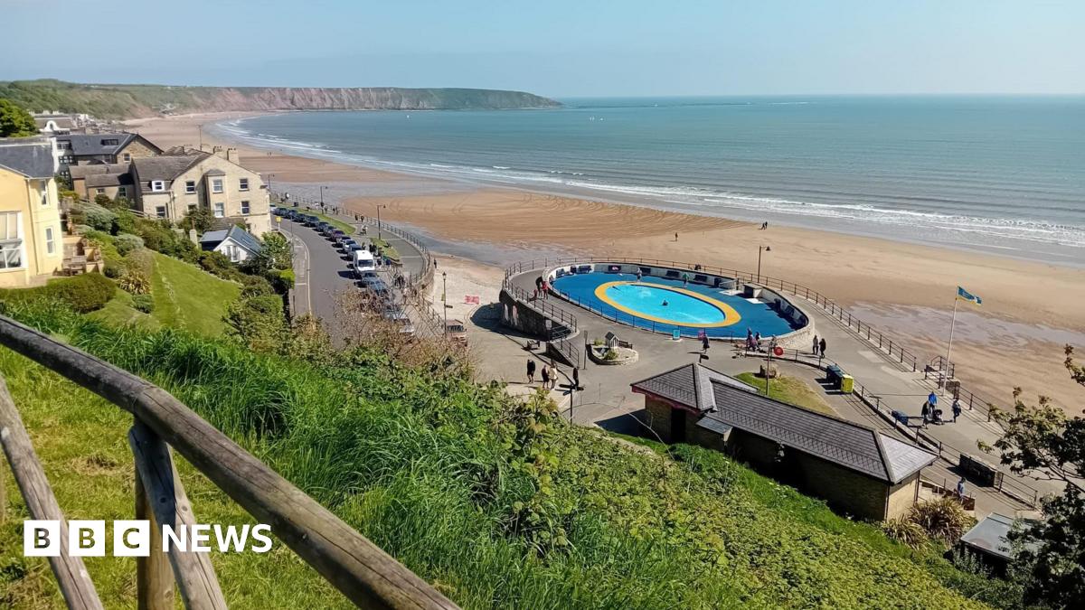 A view of the Filey coastline with beach and cliffs visible