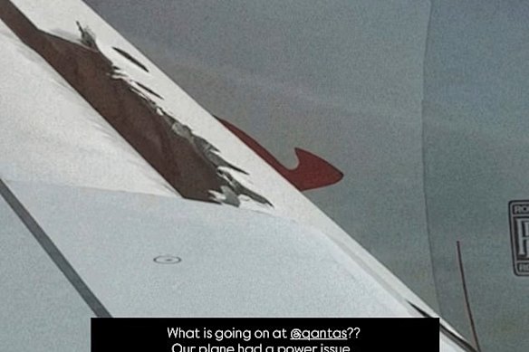 A photo posted on Instagram by passenger Lynn Gilmartin showing a hole in the wing of a Qantas plane.