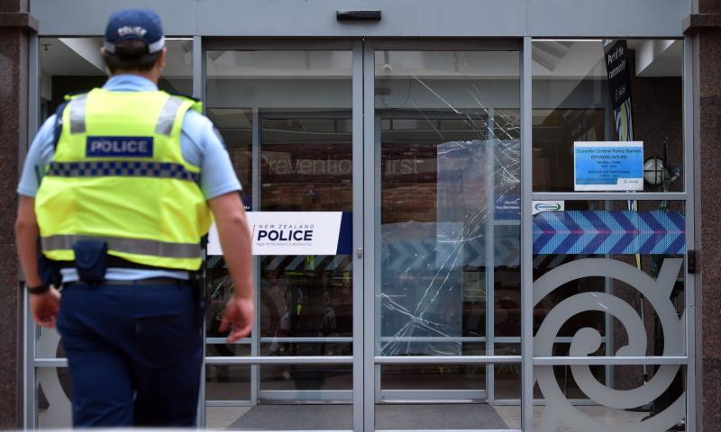 Man in Mob t-shirt smashed door at Dunedin cop station